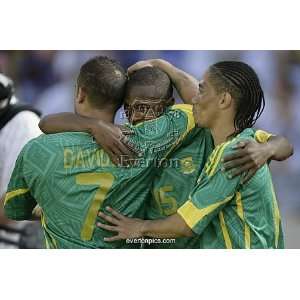  South Africas Parker celebrates with teammates Davids and 