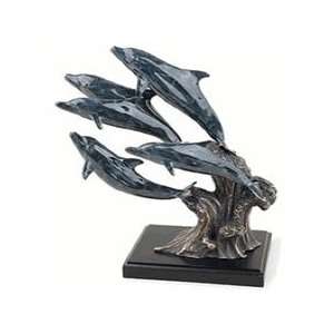  Dolphin Quintet on Wave Sculpture