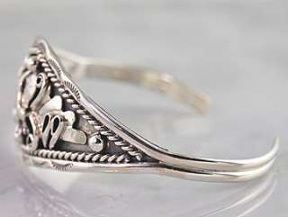 Description Sterling Silver Bracelet. Accenting the Bracelet is an 