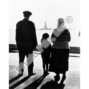  Immigrant family on Ellis Island looking across New York Harbor 