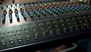 The TOA CX 124 is a mixing console with 12 input channels, 4 Group 