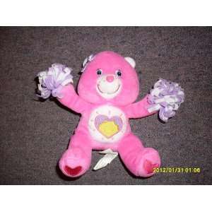   Sitting Shine Bright Care Bear with Bow and Pom Poms: Everything Else