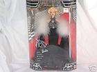 1998 STEPPIN OUT BARBIE DOLL IN BLACK GOWN NIB