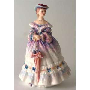   Small lady figurine in blue dress and holding umbrella: Home & Kitchen