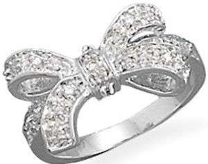 RHODIUM OVER SILVER CUBIC ZIRCONIA BOW RING SZ 6  