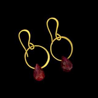 RUBY EARRINGS with 2 rubies equaling 19.27 total carat weight.With 