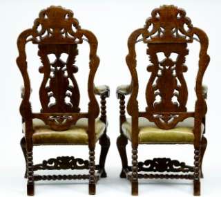 PAIR OF HEAVILY CARVED ORNATE OAK ARM CHAIRS  