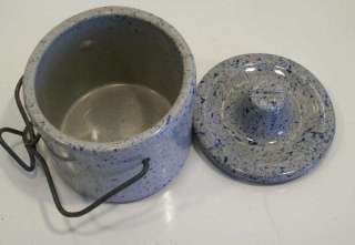 nice item here, a blue speckled pottery crock or jar with its own 