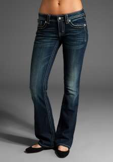 MISS ME JEANS Bootcut with Heart Peace Sign in Dark at Revolve 