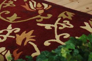 Teppich floral in bordeaux rot aus reiner Schurwolle  