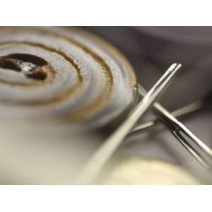 Selective Focus of Button with Sewing Needle and Thread Photographic 