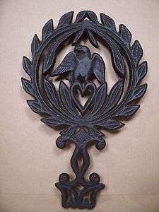 Vintage Cast Iron Trivet / Hot Plate  Eagle, Wreath of Leaves & Heart 